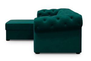 A side view of a dark green corner sofa with tufted design, highlighting its plush texture.