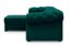 A side view of a dark green corner sofa with tufted design, highlighting its plush texture.